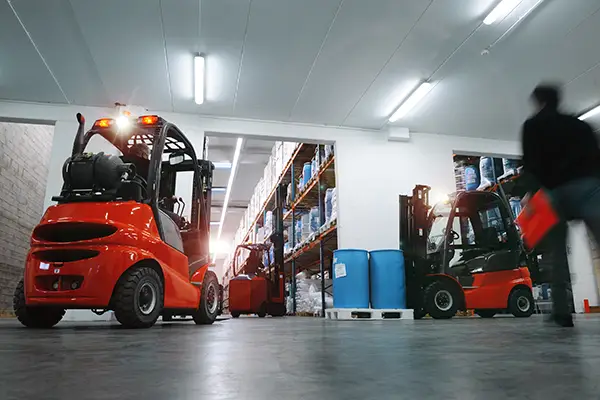moving vehicles being operated in a warehouse